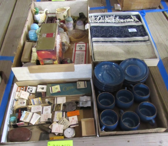 matchboxes, blue dishes and blanket