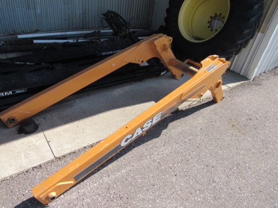 Case skid loader arm assembly
