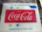 Enjoy Coca-Cola sign, glass front