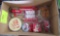 box of various Coca-Cola promotional items