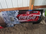 Coca-Cola vending machine front logo