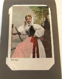 foreign postcards in album