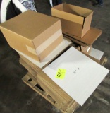 assorted boxes and cardboard sheets