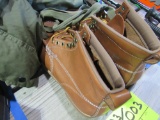 military sleeping bag and brown boots