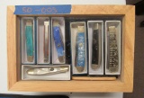 7 knives in wooden display box