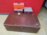 wooden chest and first aid boxes