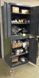 metal storage cabinet with shop tools and items