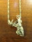 14 kt yellow gold chain with 10 kt gold pendant