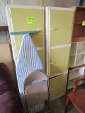 2 cabinets, ironing board and folding chair