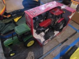 two toy tractors