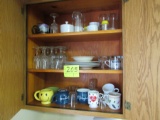 glassware and dishes in cupboard