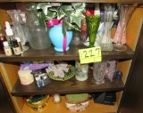 3 shelves of vases and glassware