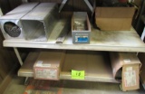 items on the bottom 2 shelves, welding rods, misc