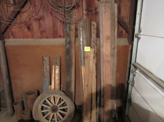 pile of misc iron, wheel, wood