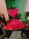 heart-shaped chair with lamp and record player