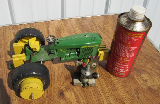 JD 5020 toy tractor with replica motor and supplies