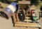 antique school desk, bird house, metal drum,