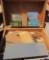 wooden box, stencils and tins
