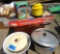 alarm clock, train set, electric lamp, metal pan, ceramic bowl