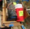 lunch box, thermos, metal tables, wooden cart