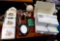 slid projector, old medicine bottles, lamp, letter sorter