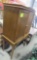 Enclosed entertainment center, folding leaf table