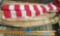 American flags, yard sticks, flag poles