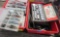 a lot of misc tools, screws, bits, socket set, drill bit set, extension cord