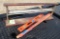 wrapping paper roller, 2 yard sticks, 2 levels