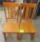 pair of wooden chairs
