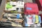 4 boxes of power strips, light blubs, electrical