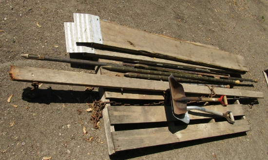 2 scoop shovels, 2 board ramps, metal posts