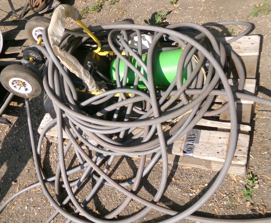 hoses, seed spreader, hand sprayer