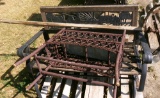 rocker bench, wicker plant box, homemade windmill