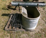 tomato cages, chicken feeder, metal livestock water