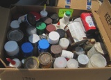 Box of spray-paint, metal jug, misc decor, chemicals, tools