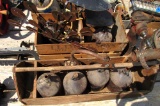 yard ordainments, glass jugs, wooden crates, chevy hub cabs