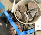 box of rocks, coffee tins of rocks, a bucket of rocks