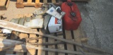 gas can, motor, bolt cutters, boat paddles