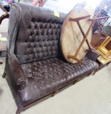 high back couch, round coffee table