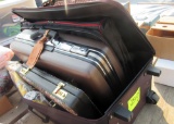 2 suitcases, 2 brief cases