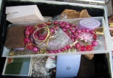 suitcase and jewelry