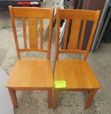 pair of wooden chairs