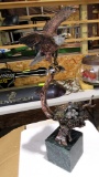 bronze eagle with eaglets statue