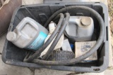 wheel, oil jugs, hose