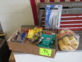 fan, box of paint rollers, pan trap, hitch, misc