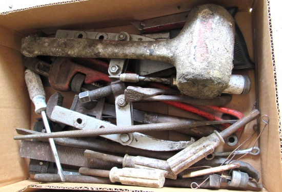 gear puller, screw driver, pipe wrench
