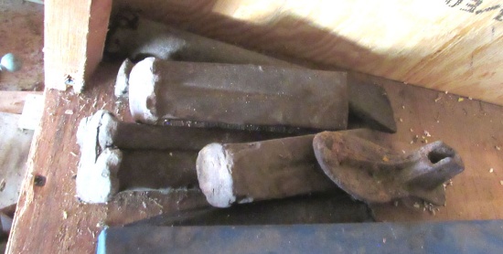 shelf od wood wedges, toolbox, car parts,
