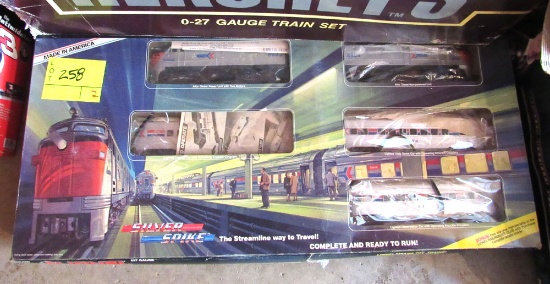 silver spike train and Hershey's train set
