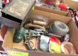 tape, wire nuts, tobacco dispenser, trowels